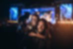 Couple taking selfie at a music concert