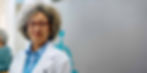 portrait-of-smiling-female-doctor-at-medical-clini-