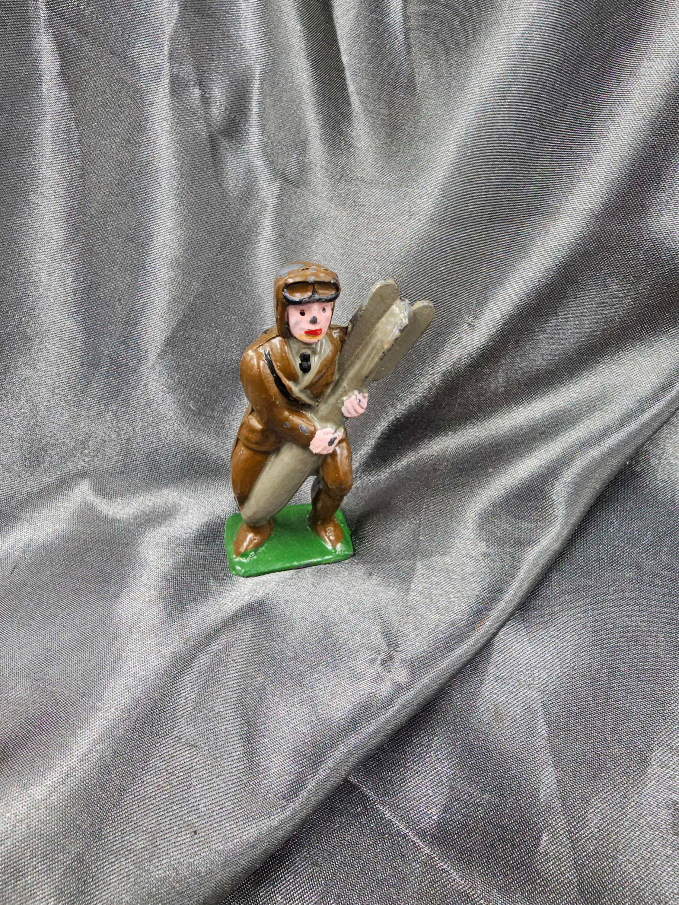 TOY SOLDIER WWI AVIATOR WITH BOMB
