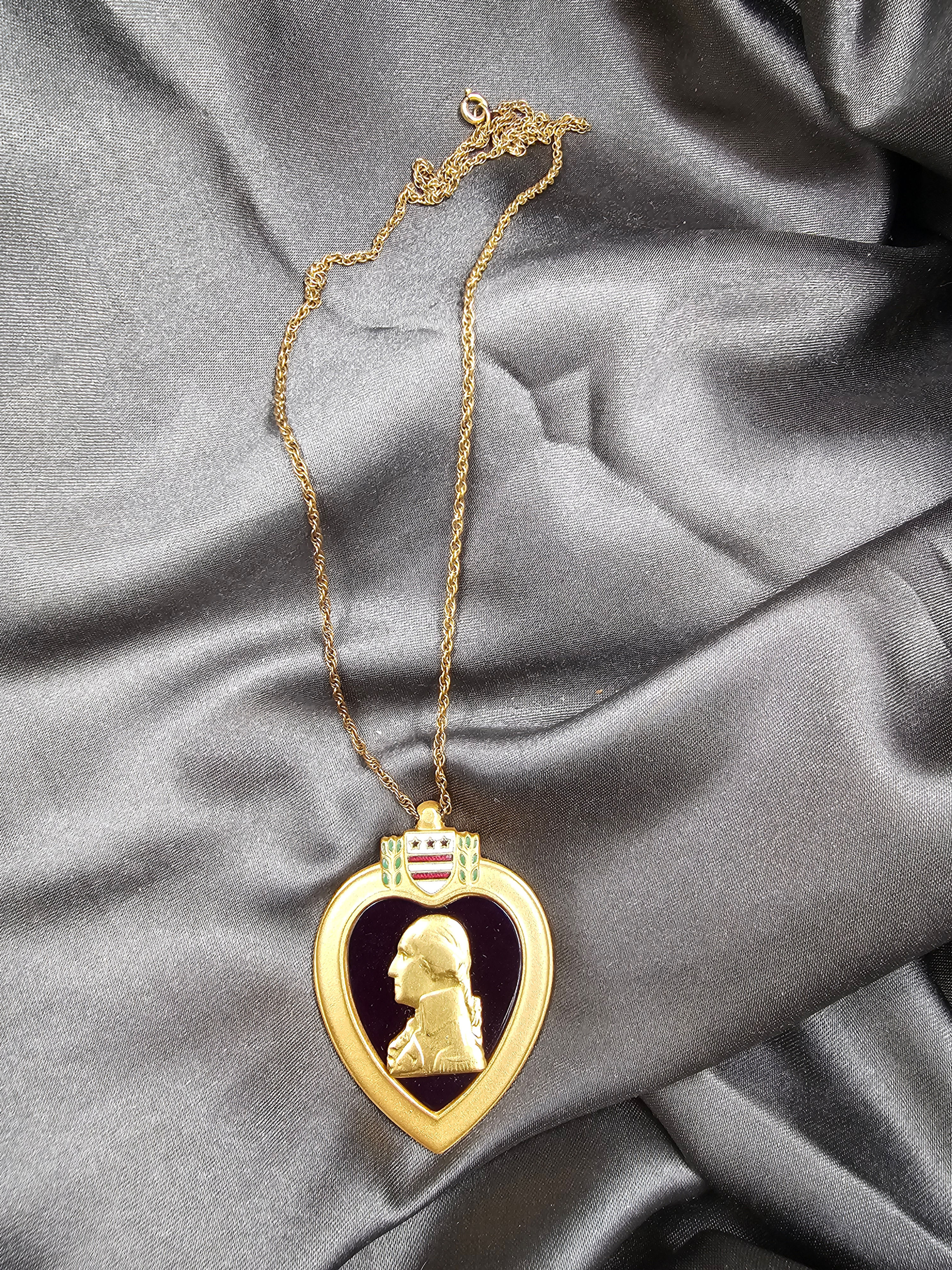 WWII US SERIALIZED PURPLE HEART MEDAL ON GOLD CHAIN