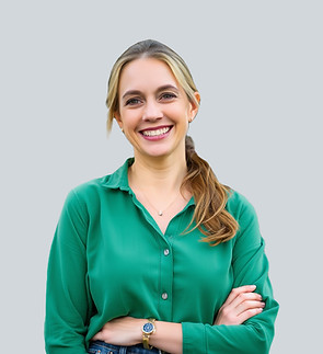 women standing alone smiling.jpg