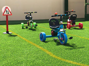 Outdoor play area bicycle race  