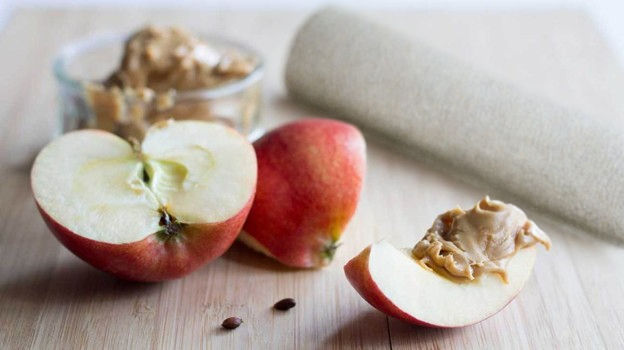 Cut apple with peanut butter