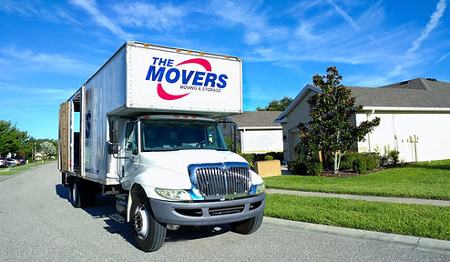 Professional Tampa moving company crew loading furniture into a moving truck at a residential home in Tampa Florida