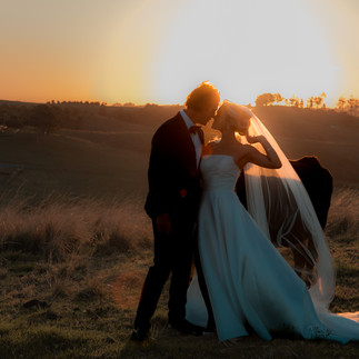 A couple kissing against the setting sun - Anima Visual, Wedding photography in the Gold Coast
