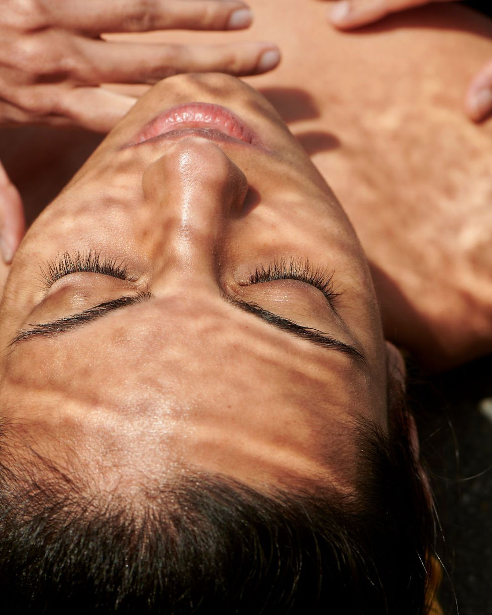 Close-up of healthy glowing skin with natural sunlight, illustrating daily UV exposure and skin health