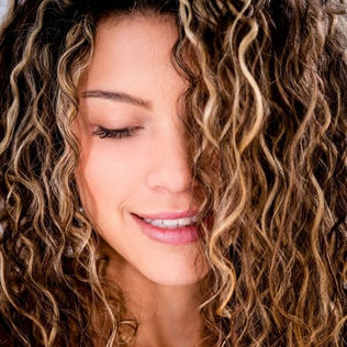 Curly Hair Hack: Discover How Wrapping Your Hair in a T-Shirt Can Enhance Your Natural Waves