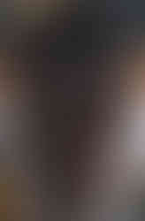 Woman with long, curled Espresso Brown hair color