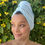 Thumbnail: woman in a blue cotton t-shirt hair towel worn in a turban wrap