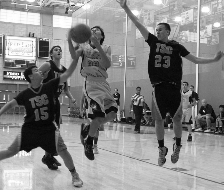 Player leaping for the ball
