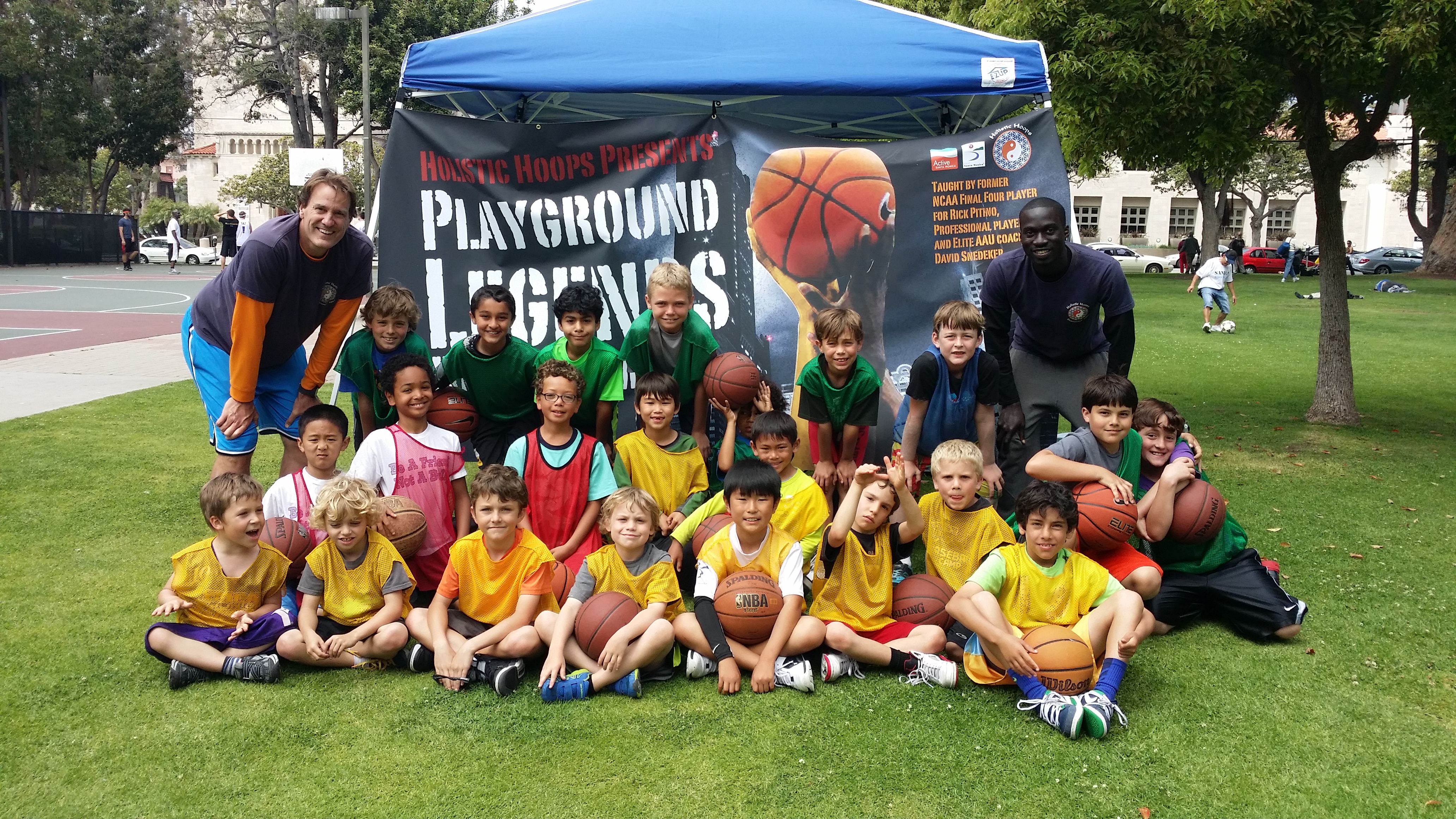 Playground Legends group photo with banner