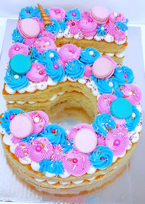 Custom number 5 cake for occasions, pink and blue frosting