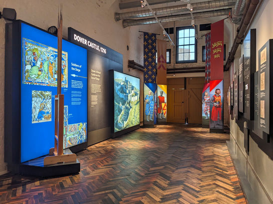 Casemate building with graphic panels including text and images