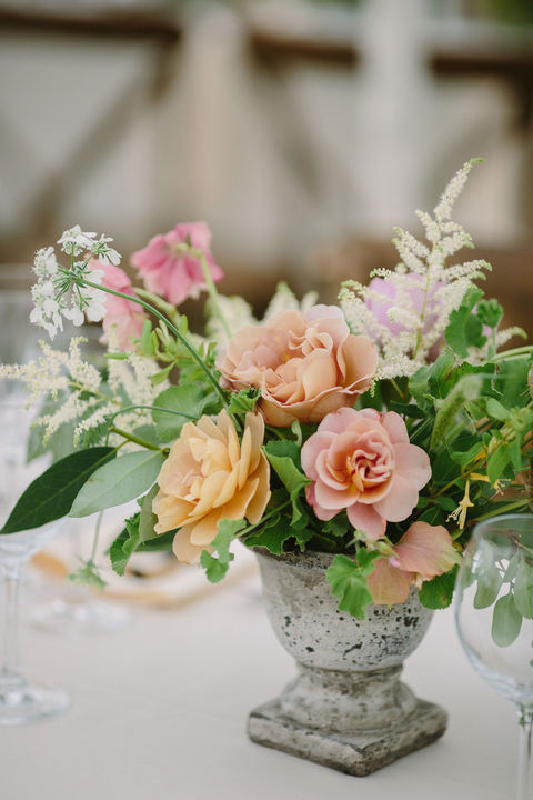Garden wedding centerpiece in pastel shades