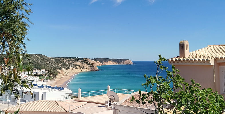 view over the Salema beach golden cliffs