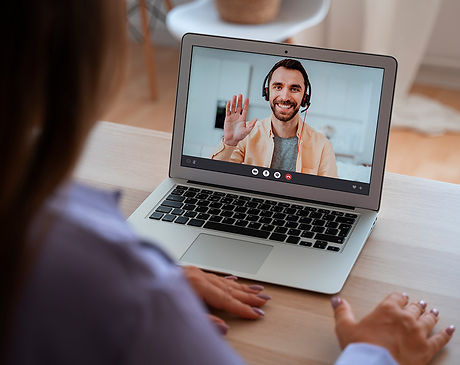 woman-having-video-call-home-laptop-device.jpg