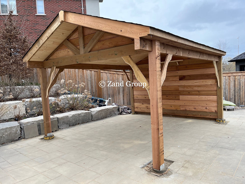 Eye-level view of a backyard deck made of pressure treated wood with outdoor furniture