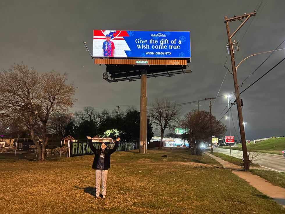 Me next to my billboard :)