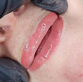 Subtle ombre style lip tattooing