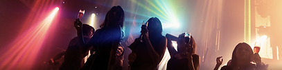 silhouette-image-people-dance-disco-night-club-music-from-dj-stage.png