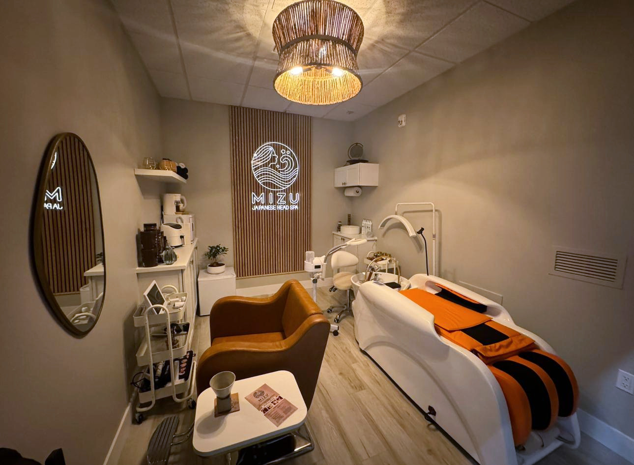 Clean, professional medical spa treatment room with neutral tones at Mizu Japanese Head Spa in Boulder