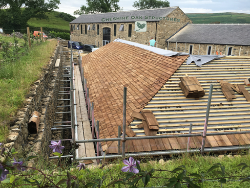 Oak framed carport with cedar shingle roof