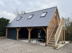 Oak frame garage with first floor accommodation