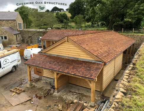 Oak garage and log store