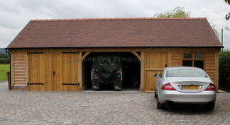 3 bay Oak garage and  store bespoke design