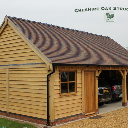 3 bay Oak garage high ridge roof & log store