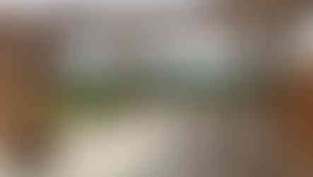 Oak frame being installed on base