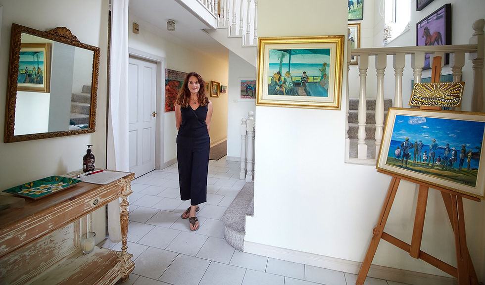 HR-CG-cath standing directly amongst the foyer paintings 2-4.jpg