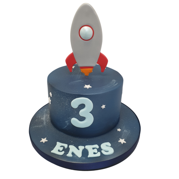 A whimsical space rocket-themed cake perfect for birthdays and special celebrations. The unique design features a rocket soaring through outer space.