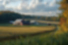 vecteezy_red-barn-dominating-corn-fields-in-scenic-autumn-landscape_53212345.jpg