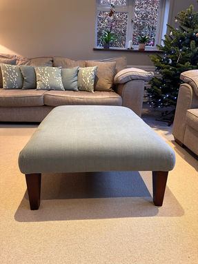 blue upholstered square footstool