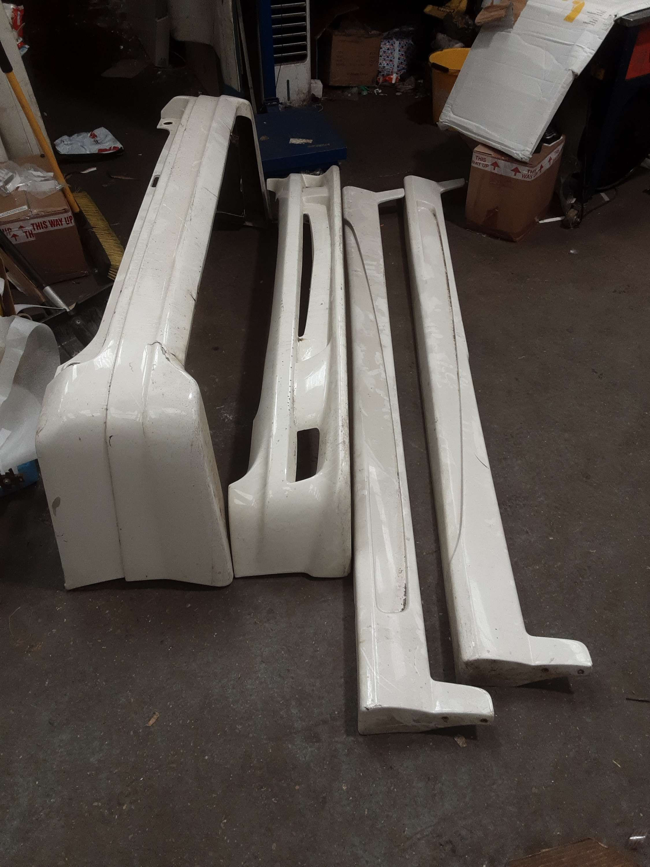 front bumper back bumper and side skirts back bumper has got crack on it see pic