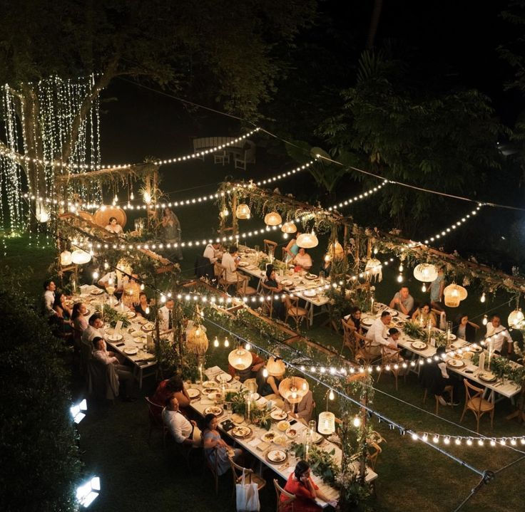 Thumbnail: farmhouse table package with hanging string light poles rental for weddings and events in San Antonio TX