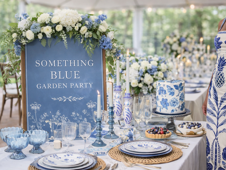 blue garden party table setting with blue and white ceramic plates, rattan placemat, glass dessert cups and candles in san antonio texas
