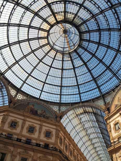 Glass dome ceiling with intricate architectural details.