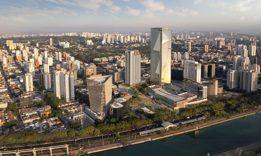 Vista aérea de cidade com arranha-céus modernos ao pôr do sol, ao lado de rio; clima urbano tranquilo.