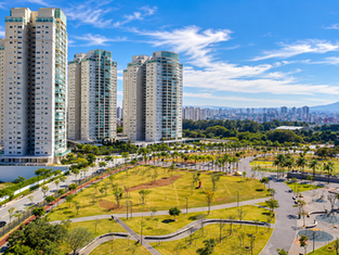 Vista aérea do Jardim das Perdizes, na Zona Oeste de São Paulo, mostrando a área verde do parque e os edifícios residenciais que formam o bairro planejado.