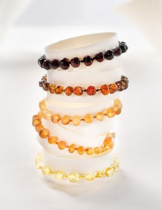 الصورة المصغرة: Premium Amber Baby Teething Bracelet - Caramel Raw, Made by Nature