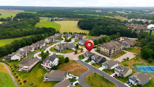 Aerial view of The Links at Gettysburg golf community with a pin marking 2 Charles Drive beside the course