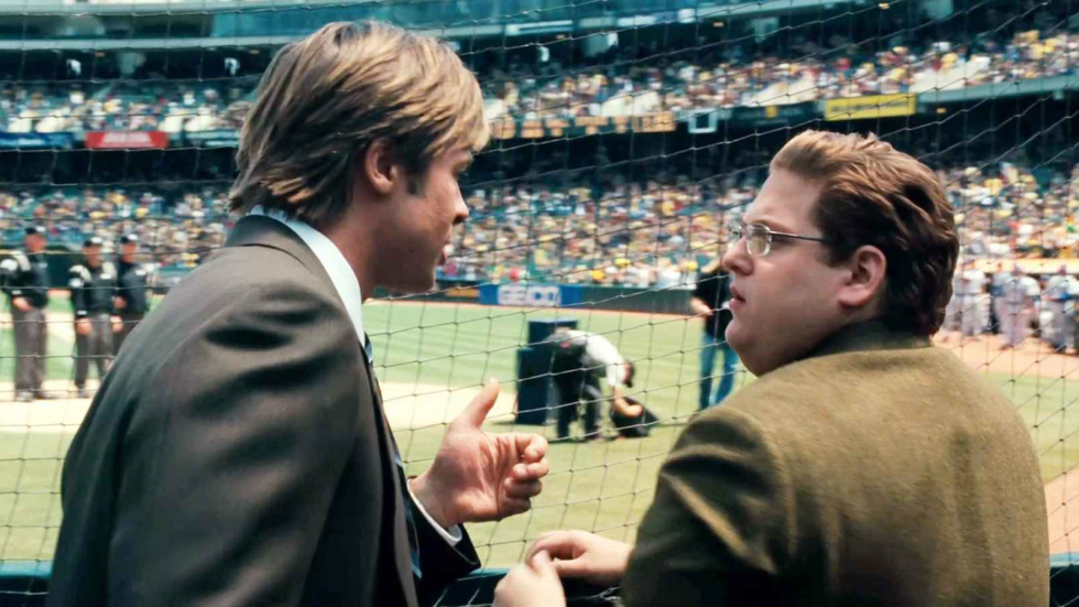 Billy Beane (Brad Pitt) and Peter Brand (Jonah Hill) attempt to overcome the odds in Moneyball