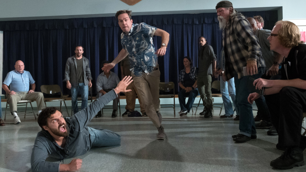 Hoagie (Ed Helms) prepares to be tagged by Jake Johnson's 'Chilli' as they crash an AA meeting to try and get their man - from Tag