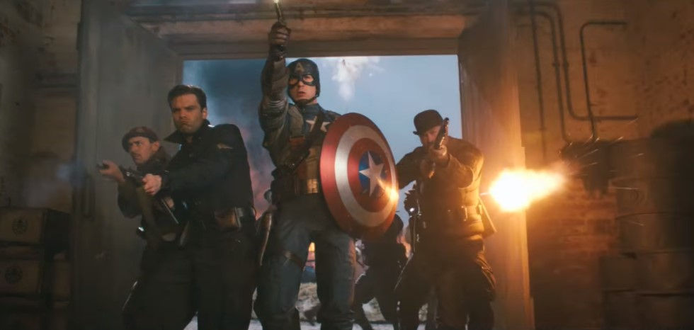 Captain America (Chris Evans) and the Howling Commandos take down a HYDRA base in Captain America: The First Avenger