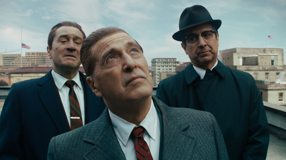 Frank Sheeran (Robert De Niro) and Bill Bufalino (Ray Romano) accompany Jimmy Hoffa (Al Pacino) in The Irishman