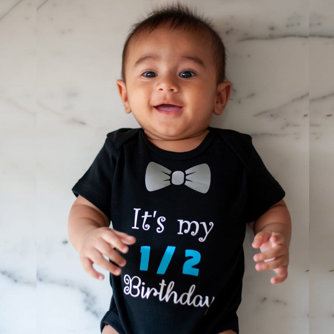 Half Birthday Black Onesie with Bow (Blue & White)