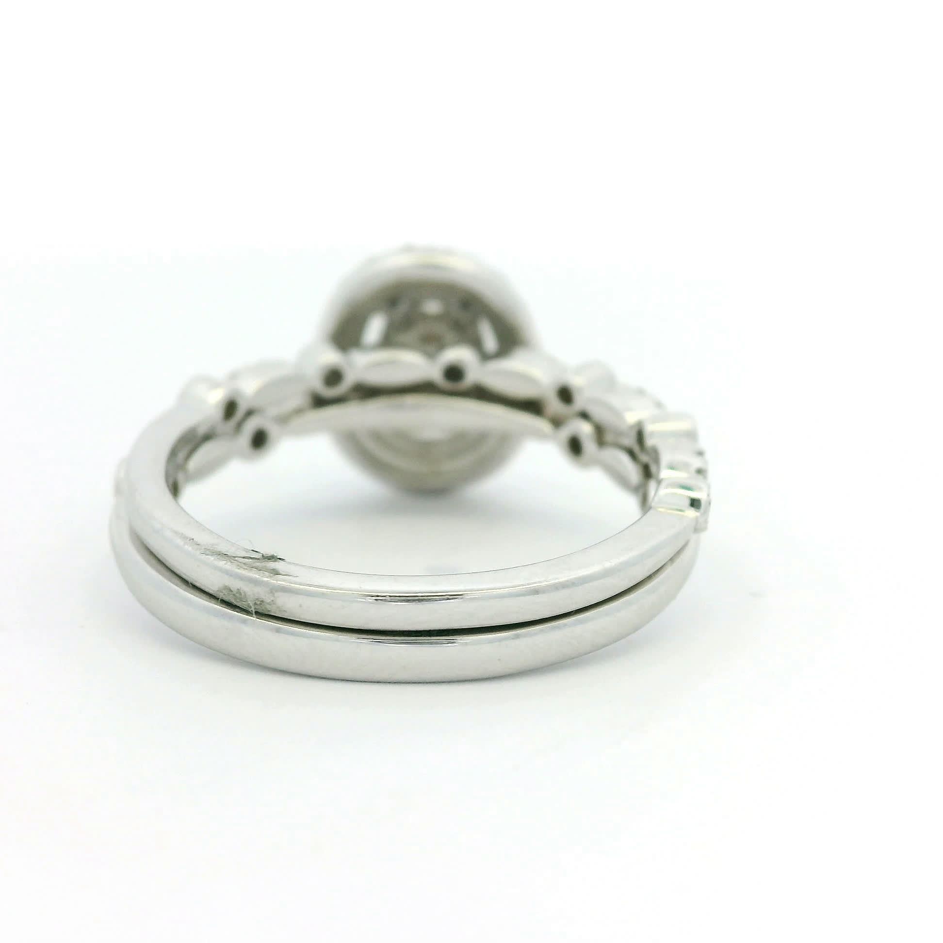 Oval Cluster Diamond Halo Ring in White Gold with Scalloped Shank