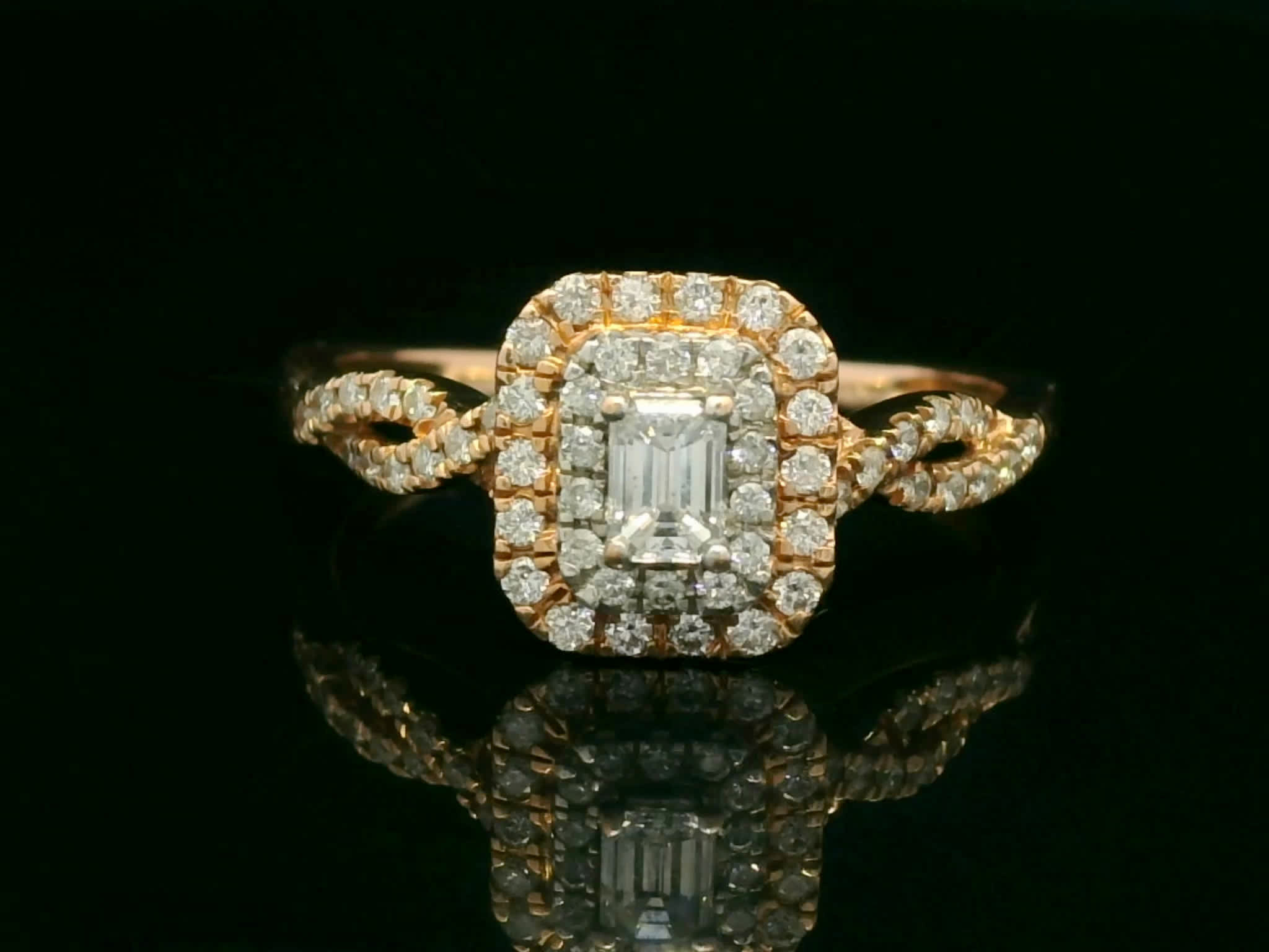 Emerald-Cut Diamond Double Halo Ring in Rose Gold with Twisted Pavé Shank